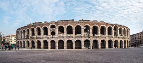 Abstract vibrant background. Colorful wavy wallpaper. Graphic concept illustration. Smooth overlapping wavy lines. Swirly colorful vibrant shapes.